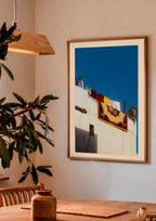 Rooftop Carpet — Enzo Benzoni limited-edition print, framed in situ (couple-dining)
